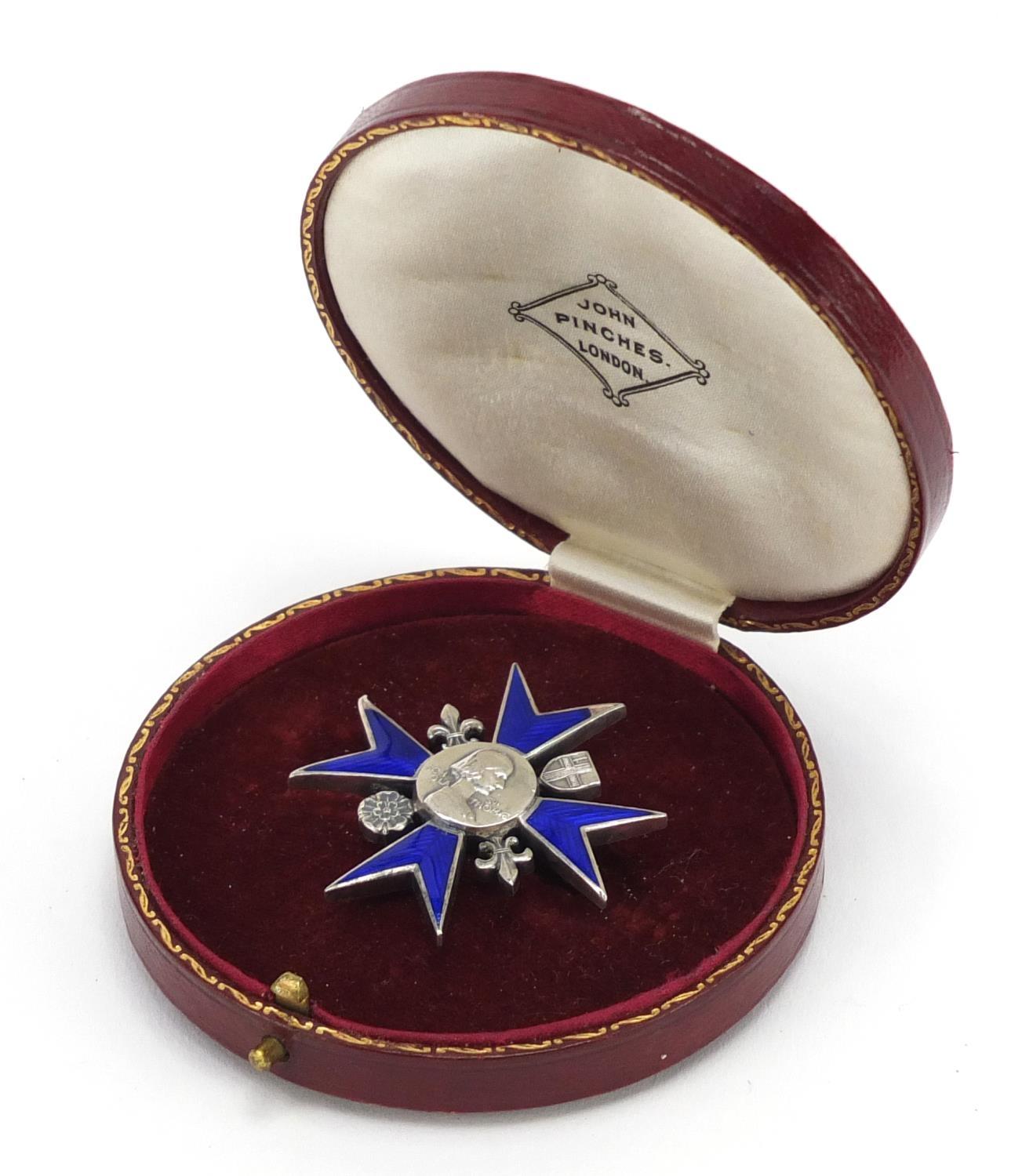 Florence Nightingale School of Nursing silver and enamel badge, with silk and velvet lined tool