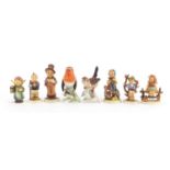 Goebel figures and birds including a boy on a tree, the largest 13cm high : For Further Condition