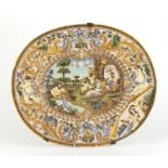 Antique Italian Majolica charger decorated in relief and hand painted with classical figures,