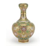 Chinese cloisonné vase enamelled with flower heads amongst foliate scrolls, 26cm high : For