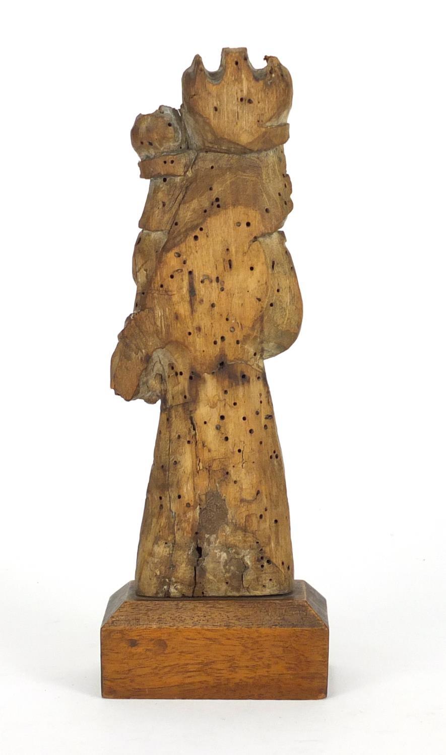 14th/15th century limewood carving of Madonna and child, raised on a rectangular mahogany block - Image 3 of 5