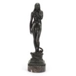 Antique patinated bronze study of a standing nude female, raised on a circular marble base, 44cm