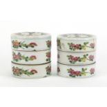 Pair of Chinese porcelain stacking containers, each hand painted with children and flowers, each