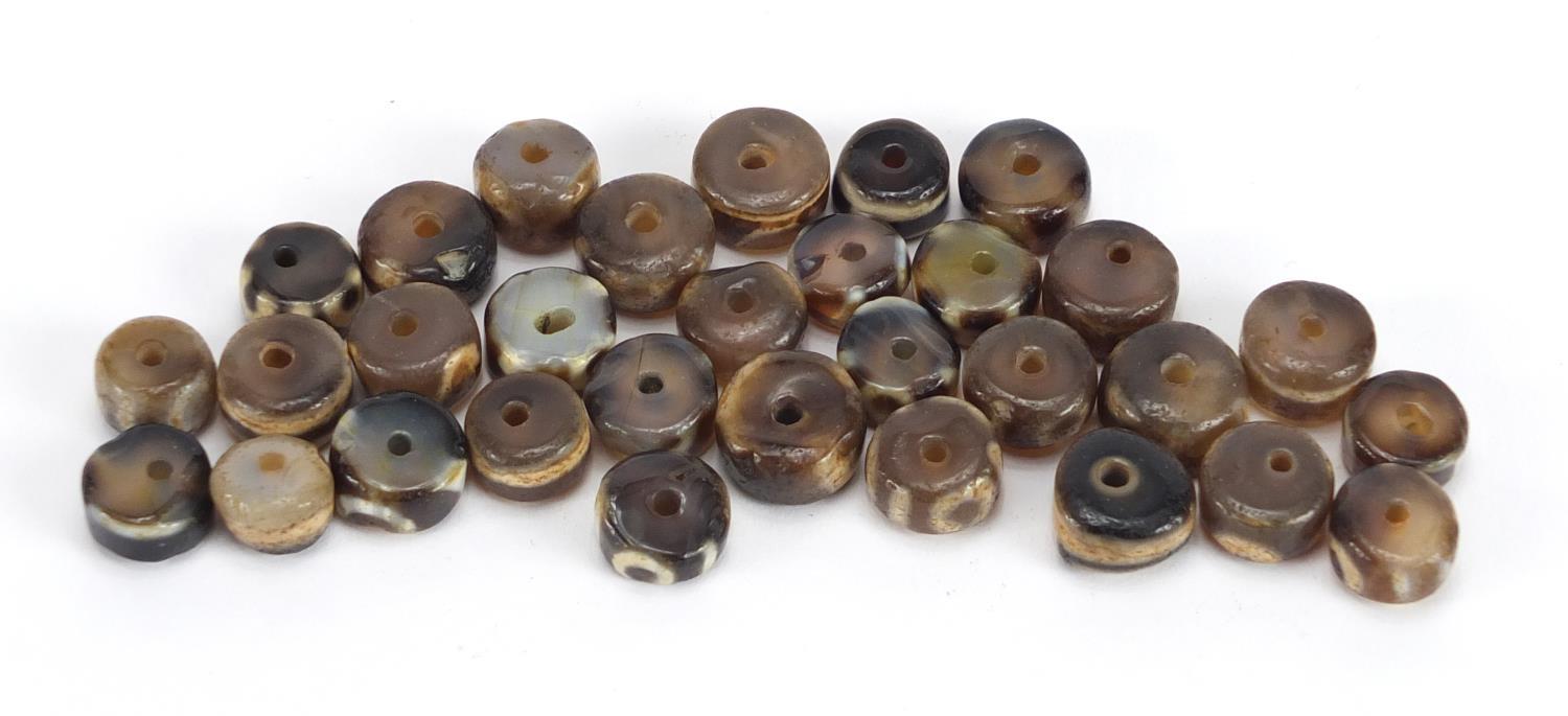Collection of Islamic agate beads, each approximately 1.5cm in diameter : For Further Condition