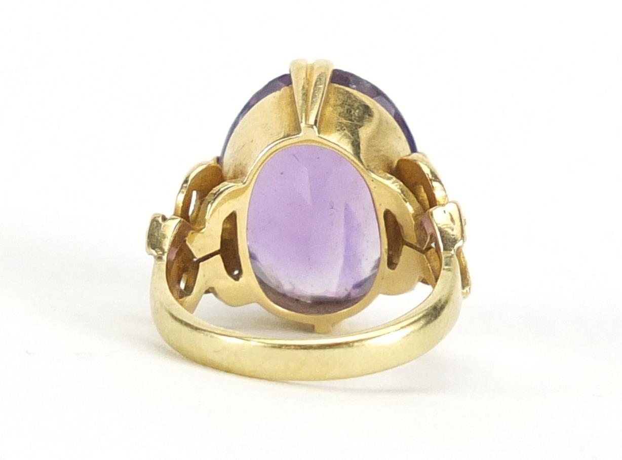 18ct gold amethyst solitaire ring, with bow design shoulders, size F, approximate weight 6.0g : - Image 3 of 4