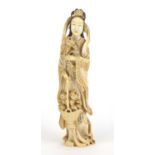 Good Japanese carved ivory Okimono of a Geisha holding a basket and flowers, character marks to