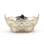 Victorian silver basket, pierced and embossed with swags, by Charles Stuart Harris London 1895, 18.