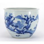 Chinese blue and white porcelain planter hand painted with a figure crossing a bridge in a