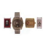 Three vintage Jump Hour wristwatches and a mystery watch, including Sicura and Smith's : For Further