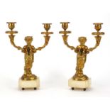 After Claude Michel Clodion - Pair of French gilt bronze faun deign candelabras with scrolling