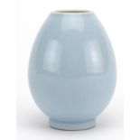 Chinese light blue glazed footed vase, six figure character marks to the base, 10.5cm high : For