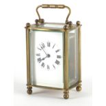 French brass cased carriage clock with enamel dial and Roman numerals, 11.5cm high : For Further