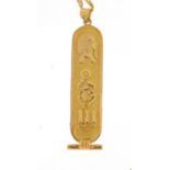 Egyptian gold ingot pendant (4.2g) on an 18ct gold rope twist necklace (2.9g) the pendant 4.6cm in