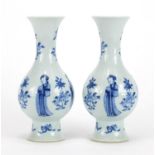 Pair of Chinese porcelain baluster vases, each hand painted with four females and flowers above