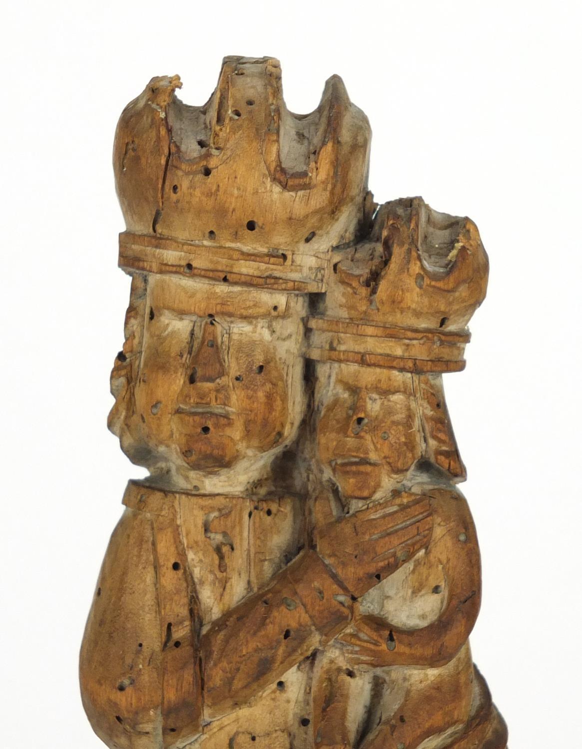 14th/15th century limewood carving of Madonna and child, raised on a rectangular mahogany block - Image 2 of 5