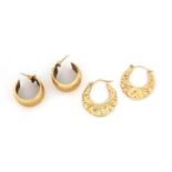 Two pairs of 9ct gold hoop earrings, the largest 2.4cm in diameter, approximate weight 4.2g : For
