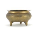 Chinese bronze tripod incense burner, character marks to the base, 8.5cm high x 14.5cm in diameter :