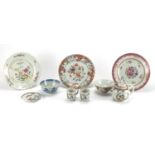 Chinese porcelain including a famille rose teapot, three famille rose plates and a footed blue and