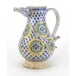 19th century Turkish Kutahya pottery water jug, hand painted with flower heads, 25.5cm high : For