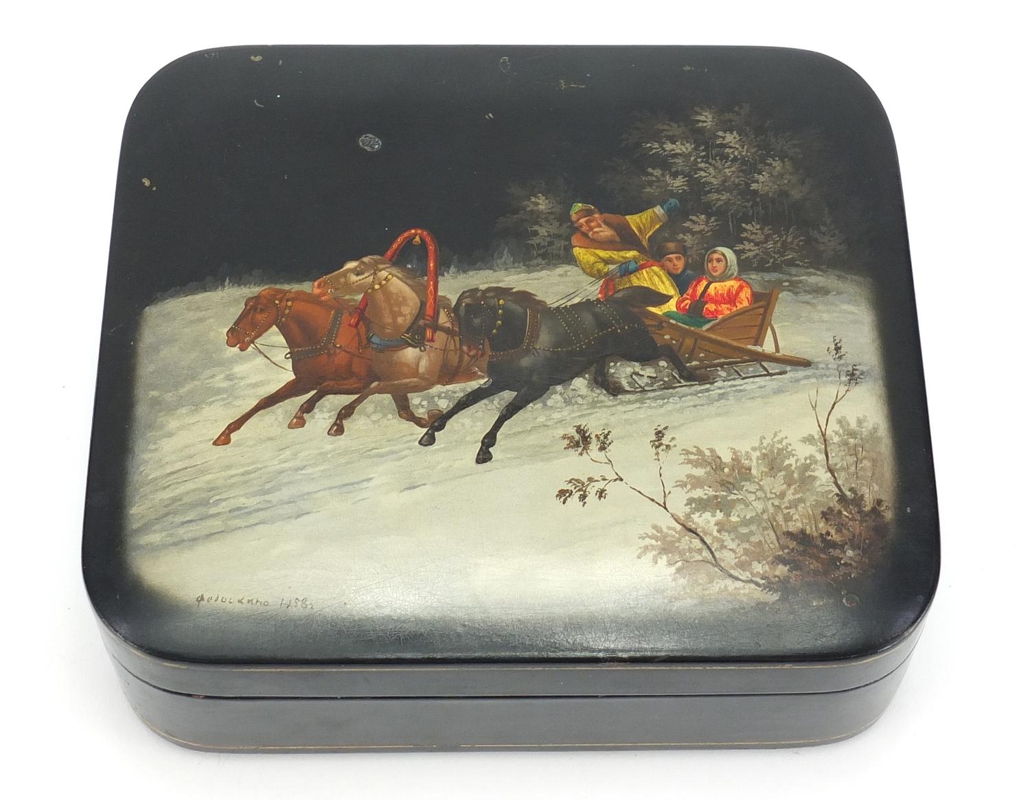 Russian black lacquered box by Fedoskino, the hinged lid hand painted with figures in a sleigh, - Image 2 of 7
