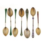 Seven silver and enamel teaspoons including Marius Hammer and P Hertz and a set of four, various