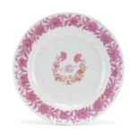 Chinese porcelain plate hand painted in the famille rose palette with flowers, 24.5cm in