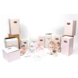 Seven Ashton Drake porcelain dolls including Snug as a Bug in a Rug, It's a Girl and Pretty as a