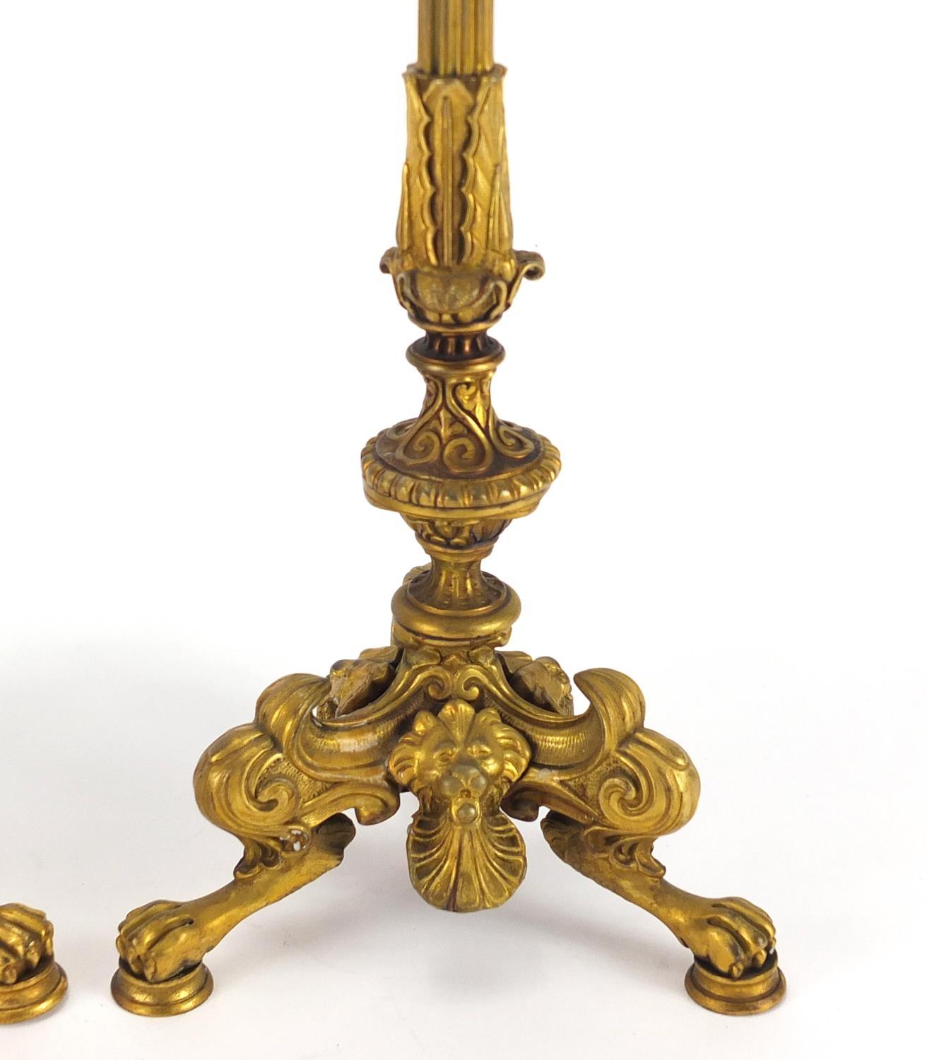 Pair of 19th century ormolu candlesticks with reeded columns, lion masks and claw feet, each 34. - Image 3 of 6