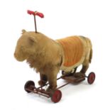 Antique Steiff stuffed ride on lion with growler, 54cm in length : For Further Condition Reports and