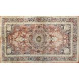 Fine Rectangular silk rug having all over stylised motifs within corresponding borders, onto a