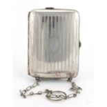 Rectangular silver cigarette case with combination match case and sovereign and half sovereign case,