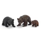 Three carved Black Forest bears, the largest 20cm in length : For Further Condition Reports Please