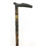 Horn handled walking stick with segmented horn shaft, the handle possibly rhinoceros horn, 86cm in