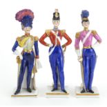 Three 19th century Capodimonte hand painted porcelain soldiers, factory marks to the bases, the