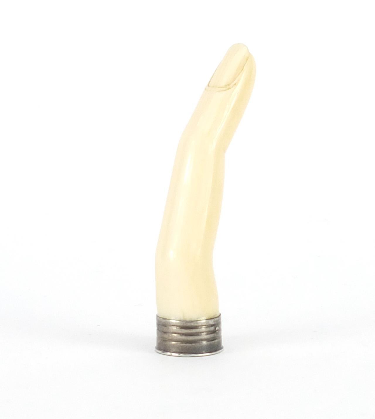 Good 19th century carved ivory pipe tamper in the form of a ladies finger, 6.5cm in length :For