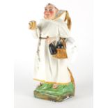 Novelty 19th century continental porcelain monk box and cover, 31.5cm high :For Further Condition