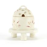 Early Belleek beehive design preserve pot and cover, hand painted with bees, factory marks to the