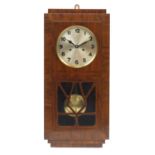 Art Deco walnut American Clock Co wall clock, with silvered dial and Arabic numerals, 68.5cm high :