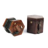 Good mid 19th century burr yew forty eight button concertina by C Wheatstone of London with ivory