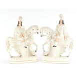 Pair of Victorian Staffordshire flat back figures of figures on horsebacks, the largest 38cm high :