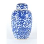 Chinese blue and white porcelain jar and cover, hand painted with flowers and foliage, blue ring