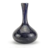 Scottish blue mottled blue glass vase by Ysart, remnants of paper label to the base, 23cm high :