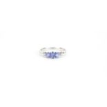 14ct white gold purple stone and diamond ring, size N, 2.1g :For Further Condition Reports Please