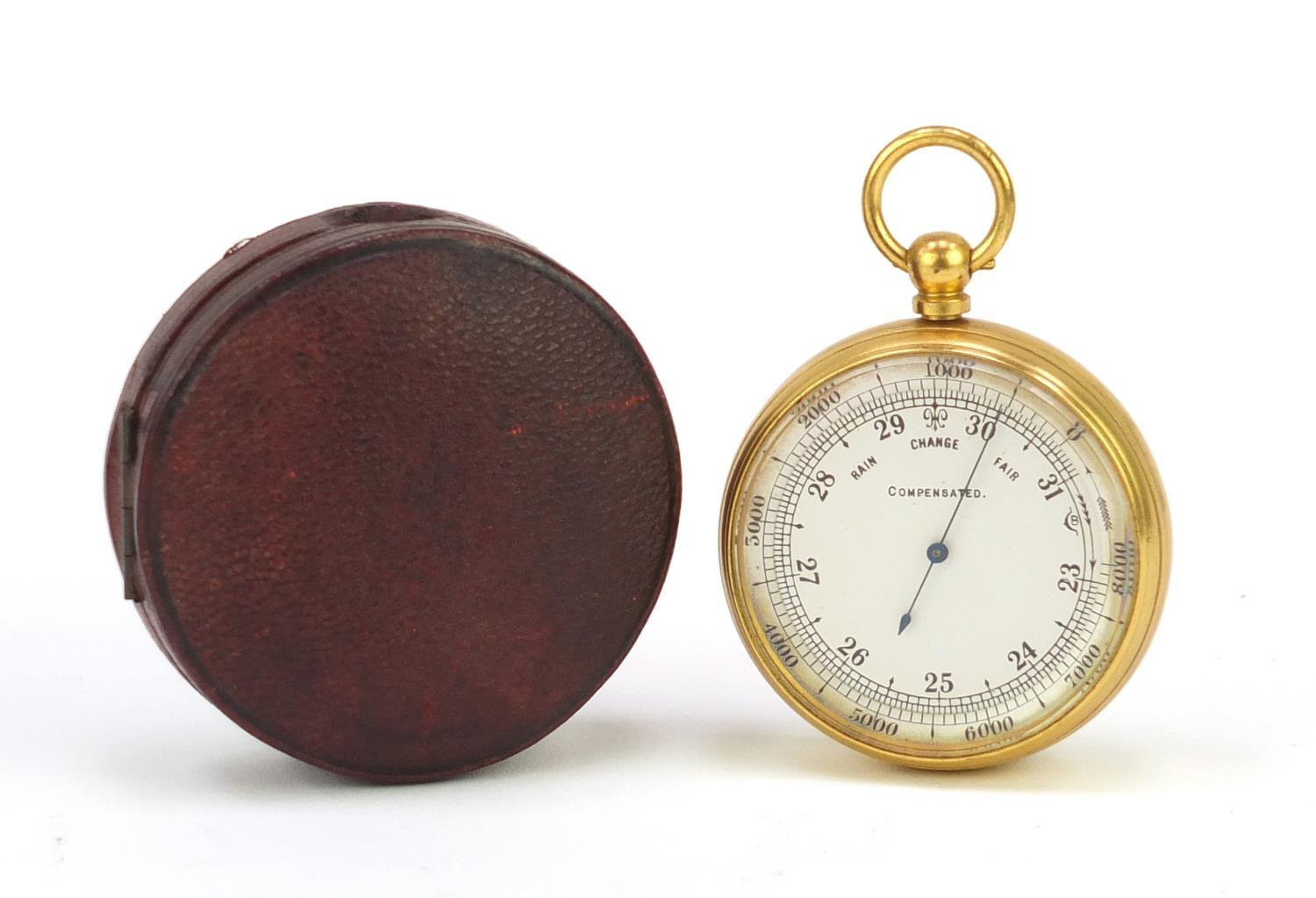 Gilt brass pocket compensated barometer, housed in a velvet and silk lined leather case, 5cm in