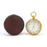 Gilt brass pocket compensated barometer, housed in a velvet and silk lined leather case, 5cm in