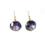 Pair of unmarked gold Alexandrite solitaire earrings, 1.2cm in diameter, 6.8g :For Further Condition