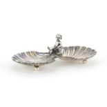 Unmarked silver caviar dish, mounted with putti seated on a dolphin, 13.5cm wide, 67.0g :For Further