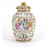 Chinese porcelain Canton vase and cover, finely hand painted in the famille rose palette with panels