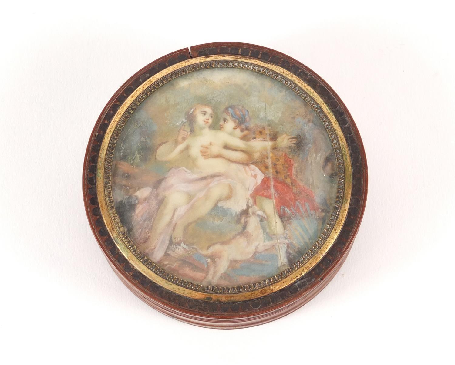 18th century circular lacquer snuff box with gold coloured mounts, metal studwork and