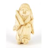 Japanese carved ivory netsuke of a figure in a robe, 4.5cm high :For Further Condition Reports